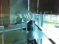 IMG 3323  Logo cut in frost vinyl and installed on boardroom glass door